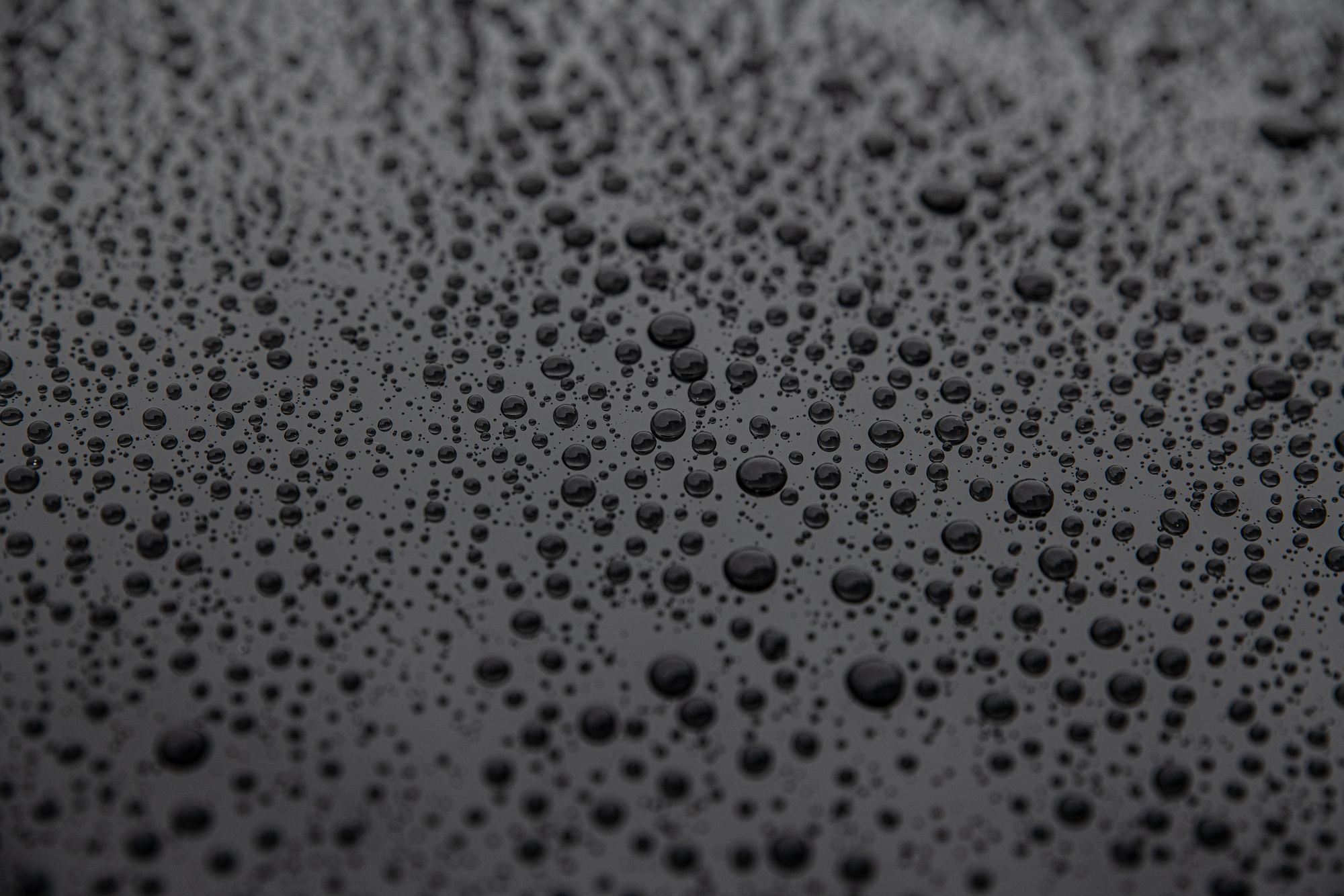 Hydrophobic effect on car varnish after using ceramic coating.